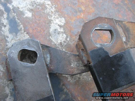 My old clutch is on the left while the F-150s clutch is on the right.  Much sharper and cleaner hole on the F-150 clutch arm.  Not sure why, since there was no slop or play on my Bronco's clutch and it fit tight and solid.  