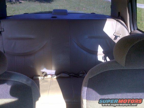 Interior rear seats and seatbelts