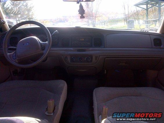 2001 Ford Crown Victoria interior showing dashboard, steering wheel, and front seats