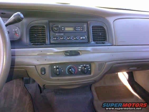 2001 Ford Crown Victoria interior dashboard with radio and climate controls