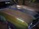 1970 Chevrolet Chevelle - A rusty green 1970 Chevrolet Chevelle SS sits outdoors with a black hood stripe and visible SS badging.