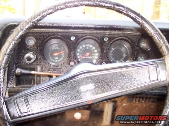 Dashboard of a 1970 Chevrolet Chevelle SS with fuel gauge, speedometer, and clock