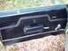1970 Chevrolet Chevelle - The interior door panel of a 1970 Chevrolet Chevelle features a prominent SS badge and chrome accents.