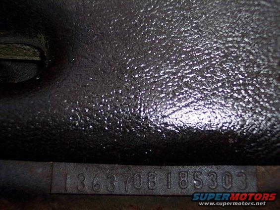 Engine block casting number 136370B185303 stamped into metal