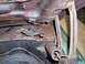 1970 Chevrolet Chevelle - The engine bay shows significant rust and wear on its components.