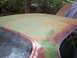 1970 Chevrolet Chevelle - The weathered roof and hood of a car show significant rust and faded paint.