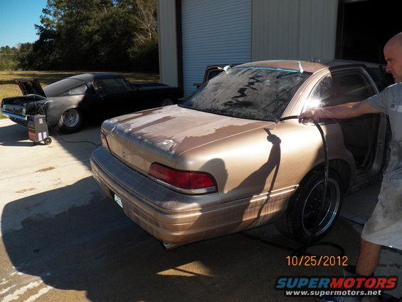 101_0567.jpg Wet sanding the whole car with 1500 and 2000 to remove imperfections.