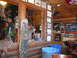 1988 Ford Bronco - A rustic room interior is decorated with a Native American statue, lanterns, and various racing memorabilia.