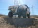 1988 Ford Bronco - This modified SUV is equipped for off-road adventures, a lifted suspension and powerful lighting for terrain.