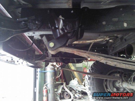 Undercarriage view of a 1993 Ford F-150 showing leaf springs and suspension