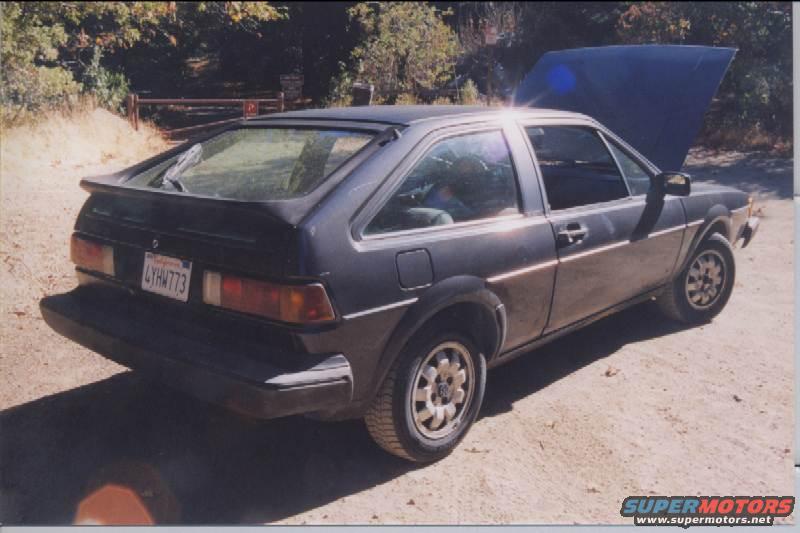 Dark hatchback with hood open, 1985 Volkswagen Scirocco