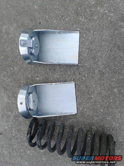 p82a0273.jpg Spring Towers from James Duff #5110. there about 2-3 inches shorter than stock. Had to weld an extenshion on. Dont have a pic of them after but you can see them in the other pics.