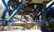 1967 Ford Mustang - Custom off-road buggy suspension components, including shocks and steering system.