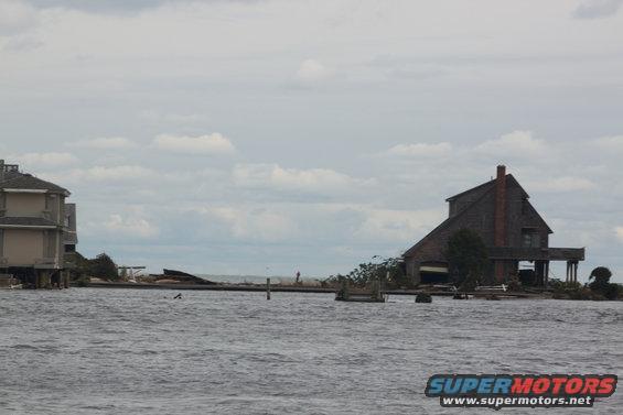 Flooded houses and debris in the aftermath of a storm