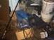 1991 Ford Crown Victoria - Welding equipment is stored in a cluttered garage or workshop area.