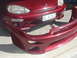 1993 Mazda MX-3 - Detached front bumper cover for a 1993 Mazda MX-3, showing the 'ODZEST' sticker.