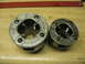 2004 Aston Martin Virage - A pair of Ridgid pipe threading dies are shown on a wooden surface.