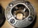 2004 Aston Martin Virage - A close-up view of a metal pipe threading die, marked with its size and manufacturer.