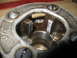 2004 Aston Martin Virage - Close-up of a pipe threading die, revealing its cutting teeth and the 'Ridgid' brand name.