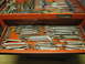 2004 Aston Martin Virage - A collection of wrenches and screwdrivers are neatly organized in an open tool chest drawer.