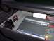 2003 Ford Taurus - An Alpine V12 car amplifier and cooling fan are installed in the trunk of a vehicle, as indicated by the date stamp on the photo.
