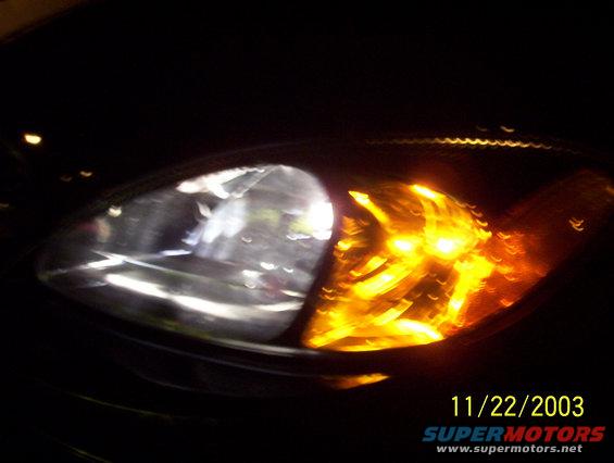 Headlight and amber turn signal of a 2003 Ford Taurus
