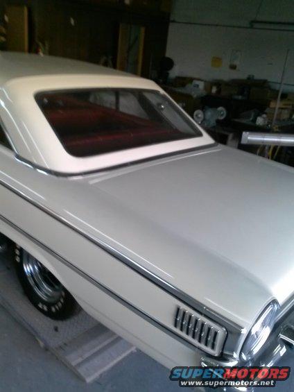 1960 Ford Falcon rear quarter view, white coupe with red interior
