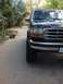 1993 Ford Bronco - The grille and headlight design suggest this truck is from the mid-1990s, not a 1993 model.