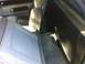 1979 Ford Ranchero - The interior of a vehicle is shown, focusing on the rear seating area and carpet.