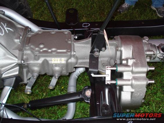 Close-up of a vehicle's transmission and transfer case, labeled RAN-R