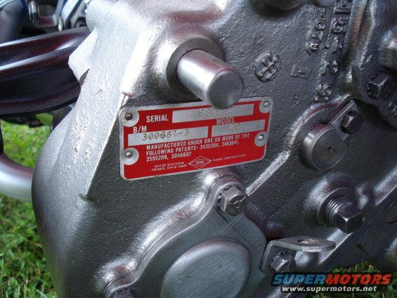 Red Spicer transmission data plate with serial number 300687-3