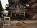 1992 Ford Bronco - Front end of a 1992 Ford Bronco undergoing work, a custom bull bar and various tools.