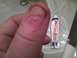 2003 Ford Crown Victoria - A thumb with cuts is shown next to a tube of Pepsodent toothpaste, with a sink visible in the background.