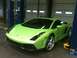 1990 Ford Bronco - A bright lime green sports car is parked in a garage, likely undergoing maintenance.