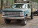 1979 Ford Bronco - This Ford F-Series truck, likely from the late 1960s, has a flatbed and is parked outdoors.