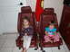1991 BMW 3 Series - Two children sit in car seats, one on the left wearing a polka dot shirt and the other on the right wearing a blue shirt.