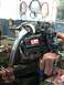 2006 Ford F-250 - Diesel engine with turbocharger and exhaust piping, appears to be out of a vehicle for service.