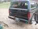 1996 Ford Bronco - Rear view of a 1996 Ford Bronco showing the tailgate, spare tire carrier, and license plate.