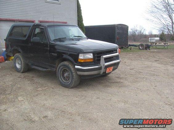 Black 1996 Ford Bronco 3/4 front view with brush guard
