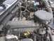 1996 Ford Bronco - Close-up view of a Ford 5.0L V8 engine, showing various components and labeling.