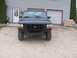 1996 Ford Bronco - Front view of a black Ford Bronco with a dark grille and amber turn signals.