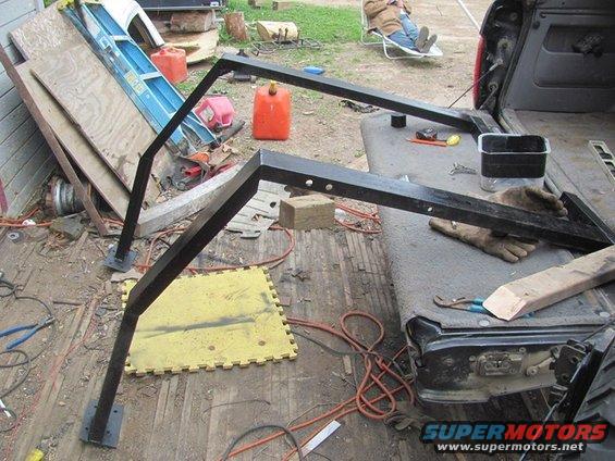 Black metal rack in pickup truck bed