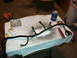 1990 Ford Bronco - A vehicle wiring harness is laid out on a cloth with various tools and smoking supplies.