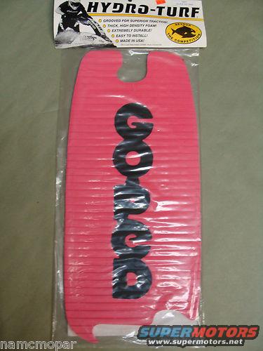 Pink Hydro-Turf mat with black lettering spelling 'GOOD'