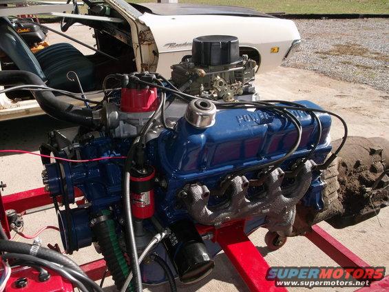 dscf03881.jpg Engine on test stand where it just finished a 3 hour break-in. Stock type 302 exhaust manifolds & single point distributor.