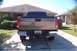 2007 GMC Sierra 1500 - Rear view of a 2007 GMC Sierra 1500 pickup truck parked in a driveway.