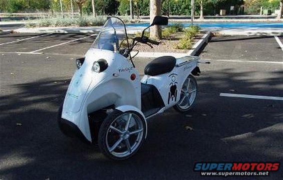 White three-wheeled scooter with a windshield and black seat
