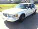 1997 Lincoln Town Car - 1997 Lincoln Town Car seen from a 3/4 front angle on a sunny day.