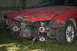 1996 BMW 3 Series - The front of a red 1996 BMW 3 Series shows significant damage, with the radiator and engine components exposed.