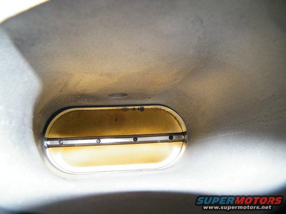 Throttle body interior with brass plate and screws